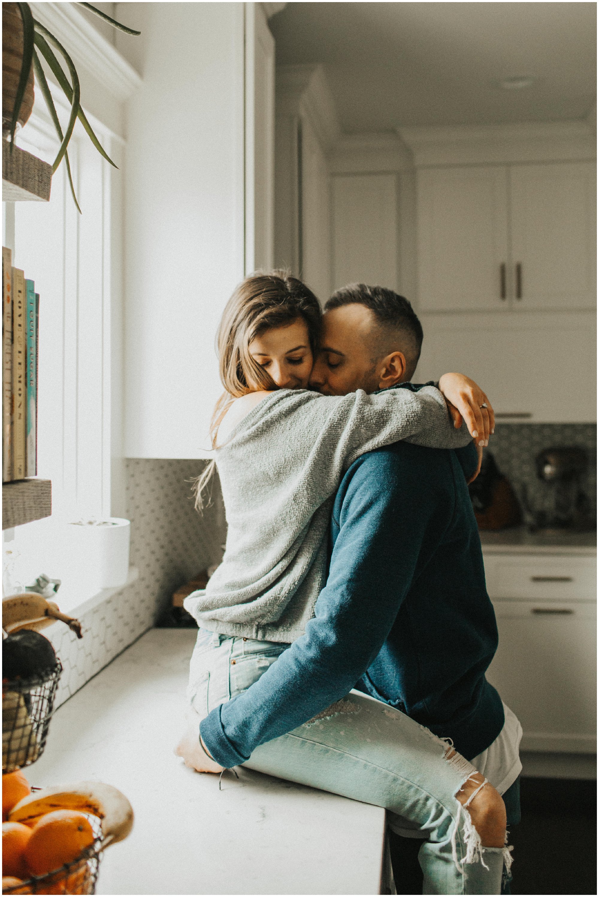 intimate at home fun engagement session in kitchen