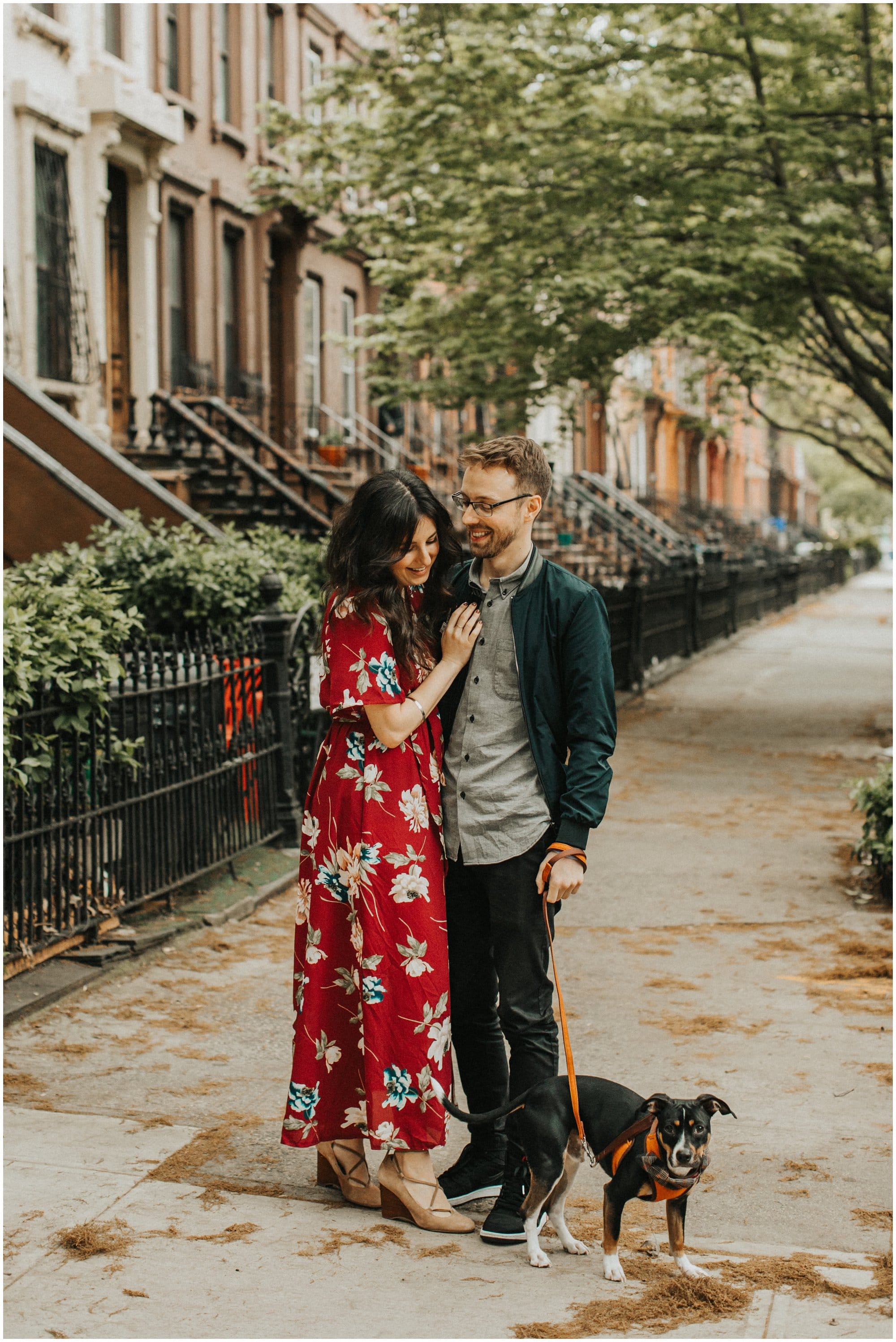 brownstone engagement photo in new york with dog