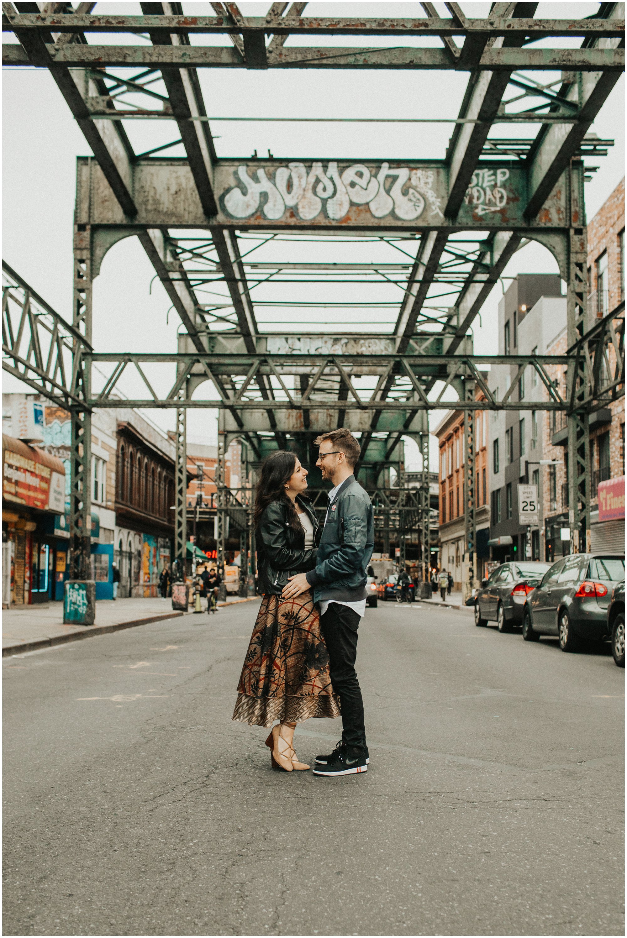 indie boho engagement photo with graffiti in Brooklyn New York